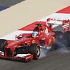 Fernando Alonso locks up a wheel while braking