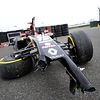 The damaged Lotus F1 E22 of Pastor Maldonado