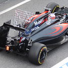 Jenson Button leaves pits in McLaren MP4-31