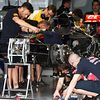 The Scuderia Toro Rosso STR10 is prepared in the pit garage