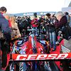 The media crowd over the Scuderia Toro Rosso STR10
